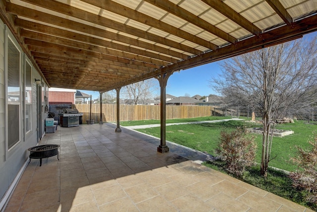 view of patio with a fenced backyard and area for grilling