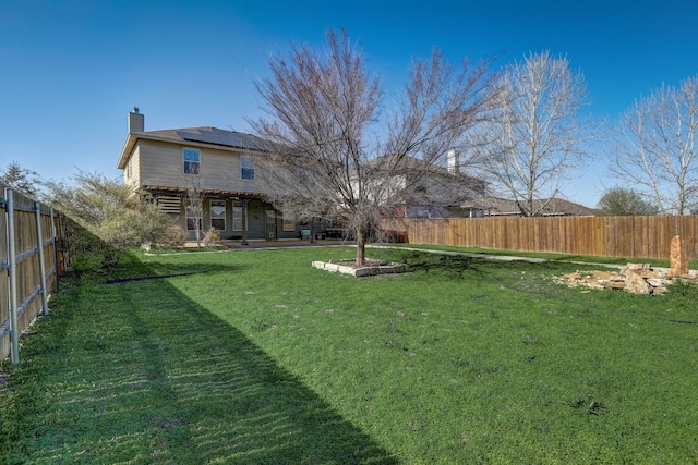 view of yard featuring a fenced backyard and a patio