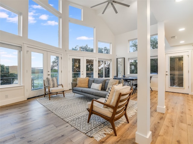 sunroom with french doors and ceiling fan