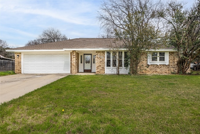 single story home with a front yard and a garage