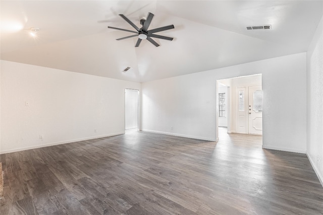 empty room featuring lofted ceiling, ceiling fan, and dark hardwood / wood-style flooring