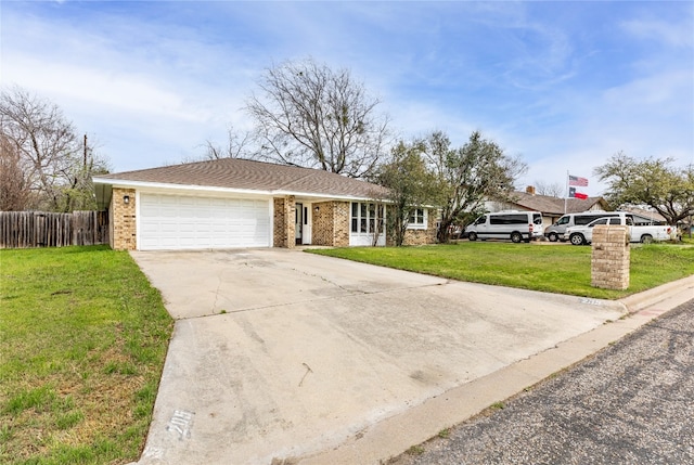 single story home with a front yard and a garage