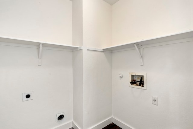 washroom with washer hookup, gas dryer hookup, electric dryer hookup, and hardwood / wood-style floors