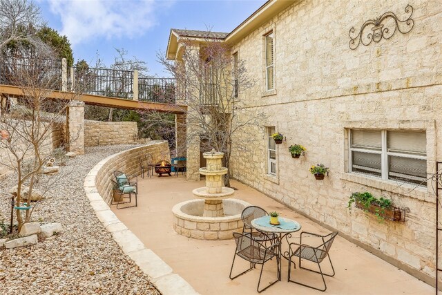 view of patio with stairway