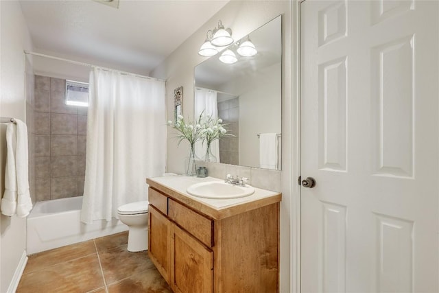 bathroom with shower / bath combination with curtain, vanity, toilet, and tile patterned floors