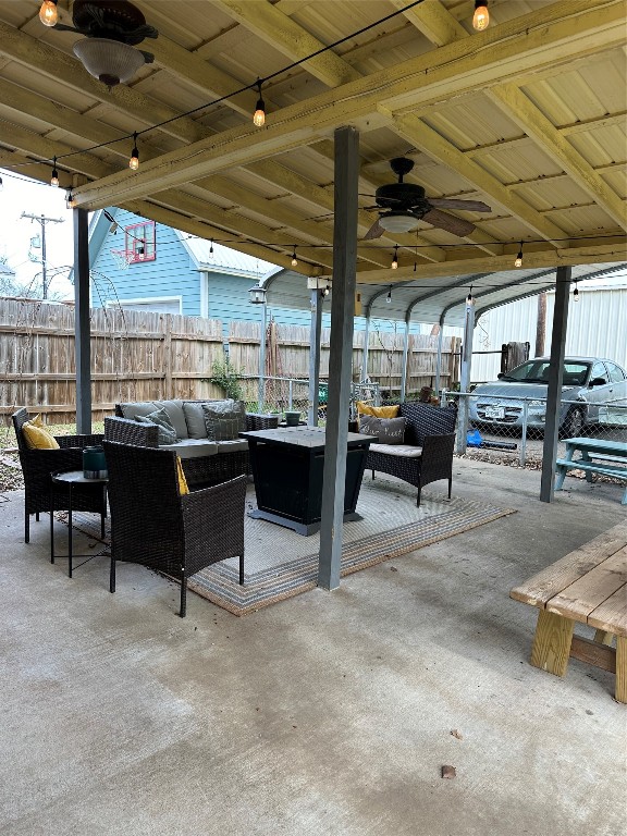 view of patio with ceiling fan and outdoor lounge area