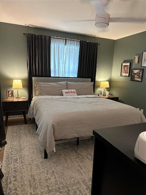 1301 NE 2nd St, Smithville, TX 78957 - bedroom with a ceiling fan