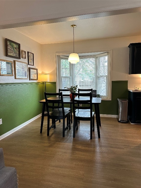 dining room with dark hardwood / wood-style floors