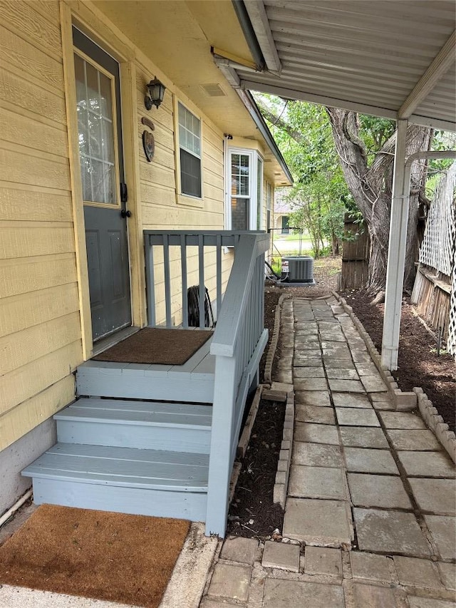 1301 NE 2nd St, Smithville, TX 78957 - property entrance with cooling unit