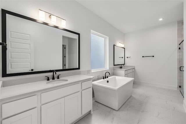 bathroom with separate shower and tub and vanity