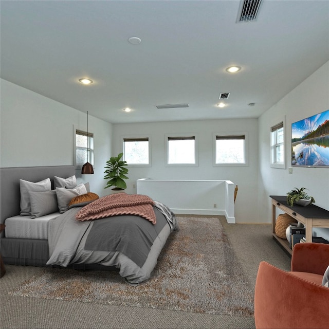 bedroom with carpet floors, baseboards, visible vents, and recessed lighting