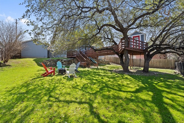 view of yard with a deck