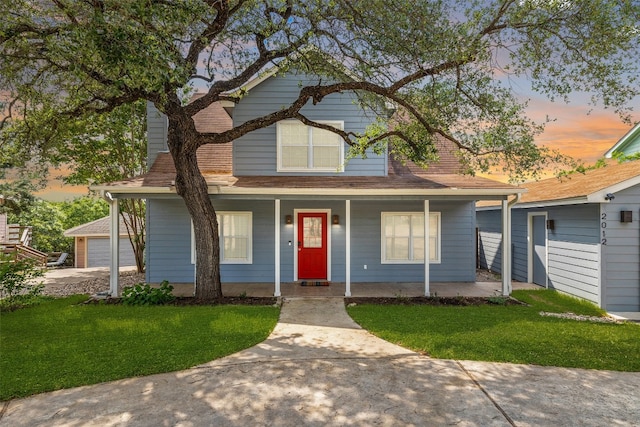 view of front of home with a lawn