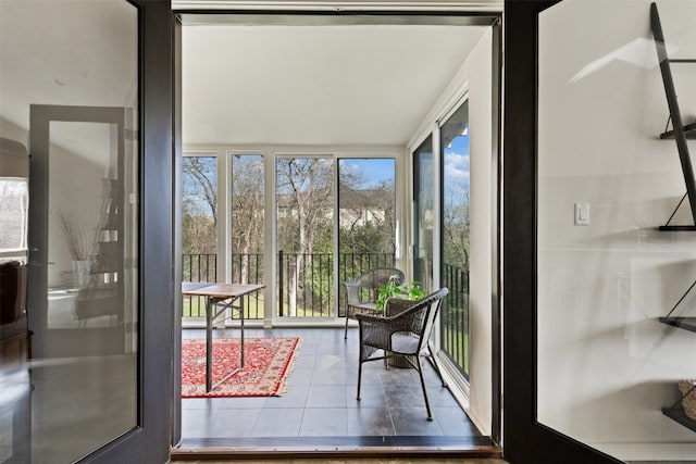 sunroom / solarium featuring plenty of natural light