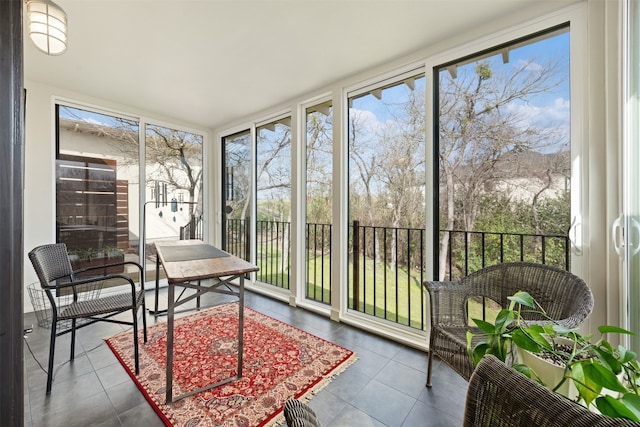 sunroom featuring a healthy amount of sunlight