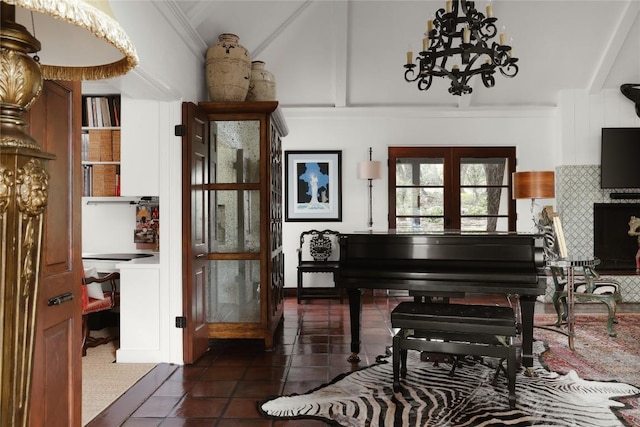 429 Sunfish St, Lakeway, TX 78734 - sitting room featuring french doors, a chandelier, and dark tile patterned flooring