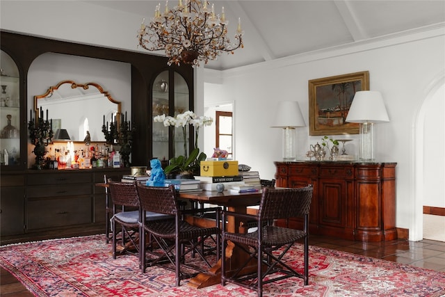 tiled dining space featuring vaulted ceiling with beams