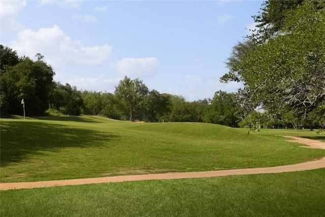 429 Sunfish St, Lakeway, TX 78734 - view of community featuring view of golf course, a yard, and view of scattered trees