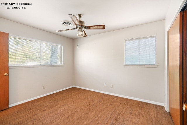 unfurnished bedroom featuring light hardwood / wood-style flooring and ceiling fan