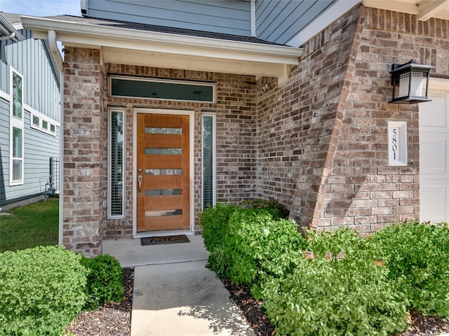 doorway to property featuring a porch