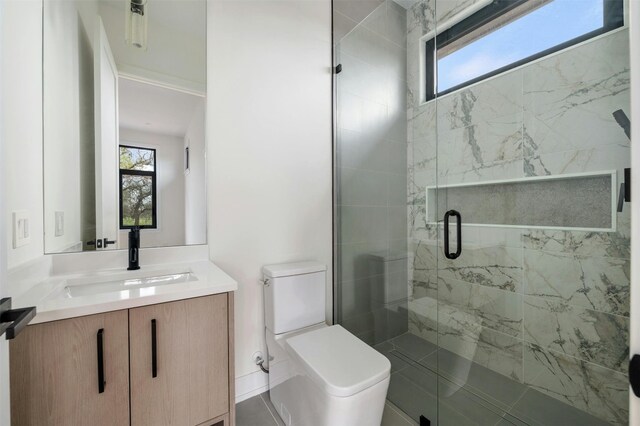 bathroom with an enclosed shower, toilet, and vanity