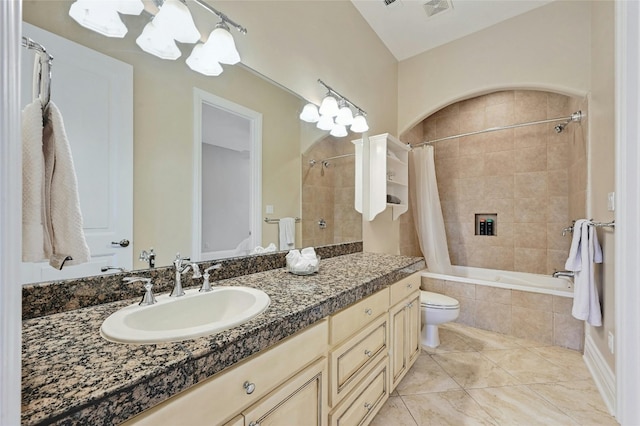 full bathroom featuring tile flooring, shower / bath combination with curtain, toilet, and vanity