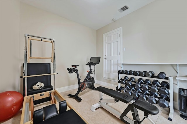 exercise area with light tile flooring