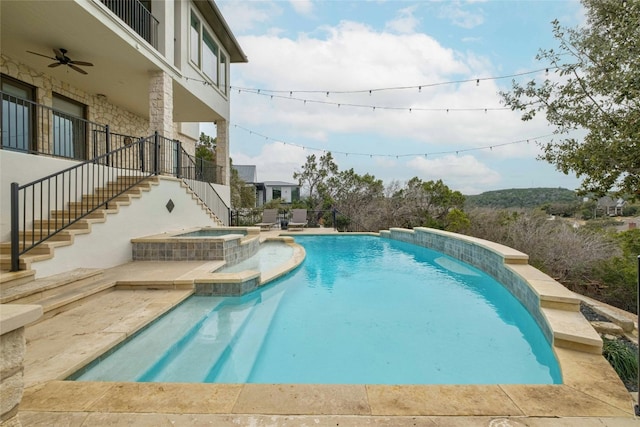 view of pool featuring an in ground hot tub, ceiling fan, and a patio