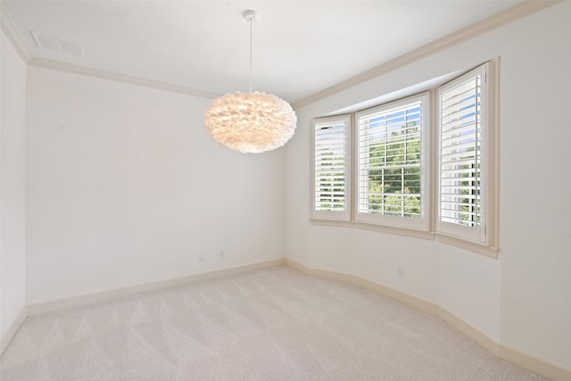 carpeted empty room with ornamental molding