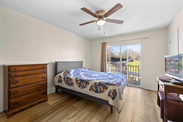 bedroom featuring access to outside, light hardwood / wood-style floors, and ceiling fan