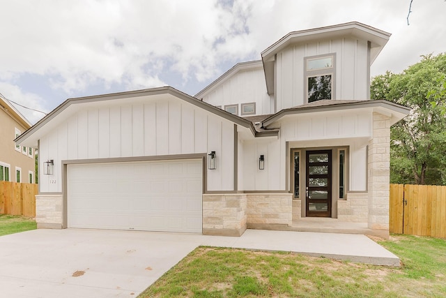 modern farmhouse style home with a garage