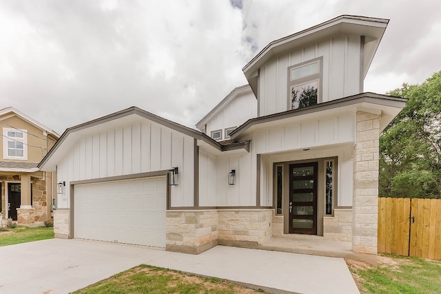 view of front of home with a garage