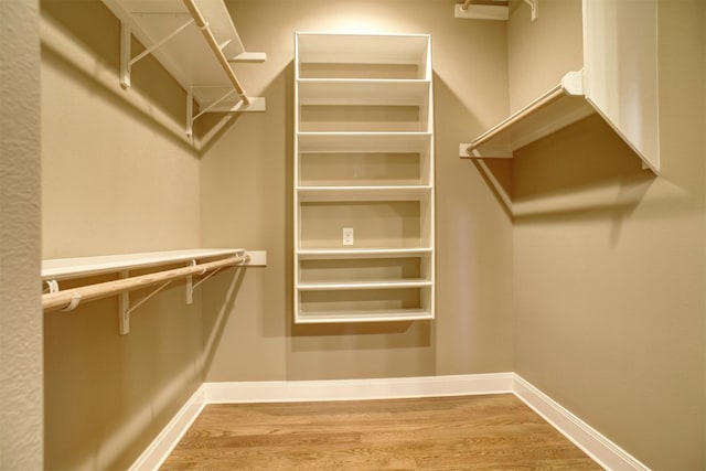 walk in closet featuring light wood-type flooring