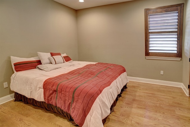 bedroom featuring light wood-type flooring