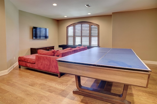 recreation room with light hardwood / wood-style flooring