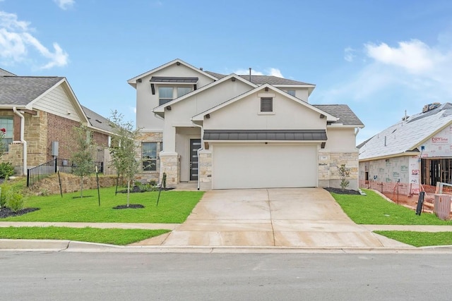 traditional home with stone siding, concrete driveway, a front yard, and fence