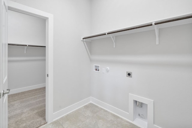 laundry area with light carpet, hookup for a washing machine, hookup for an electric dryer, and gas dryer hookup