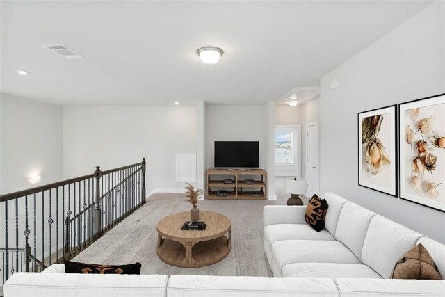 living room featuring light colored carpet