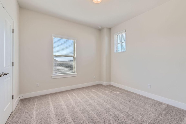 316 Chaste Tree Dr, San Marcos, TX 78666 - unfurnished room featuring baseboards and light colored carpet