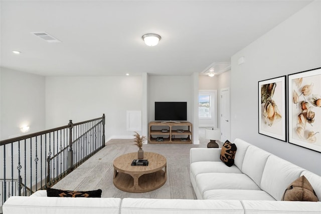 316 Chaste Tree Dr, San Marcos, TX 78666 - carpeted living area with attic access