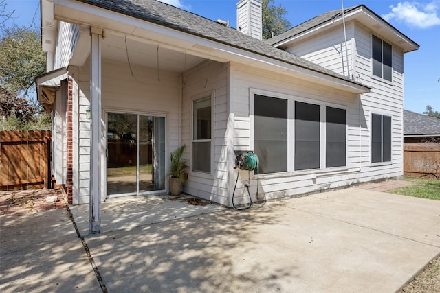 rear view of house with a patio area