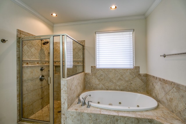 bathroom featuring independent shower and bath and ornamental molding