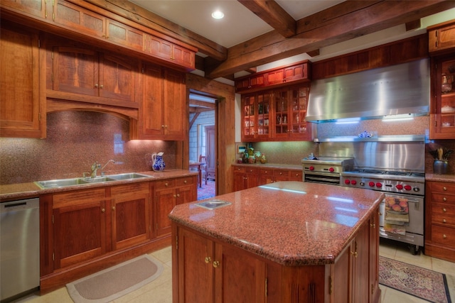 kitchen with a kitchen island, stainless steel appliances, beam ceiling, sink, and wall chimney range hood