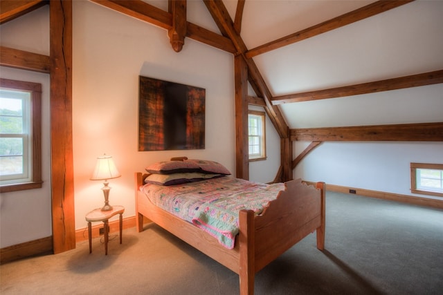 bedroom with carpet and lofted ceiling with beams