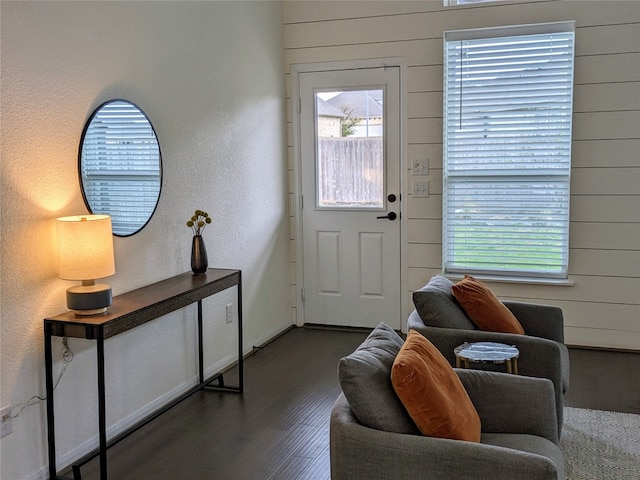 interior space with dark hardwood / wood-style flooring