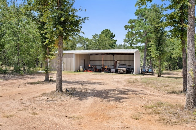 view of shed / structure featuring a carport