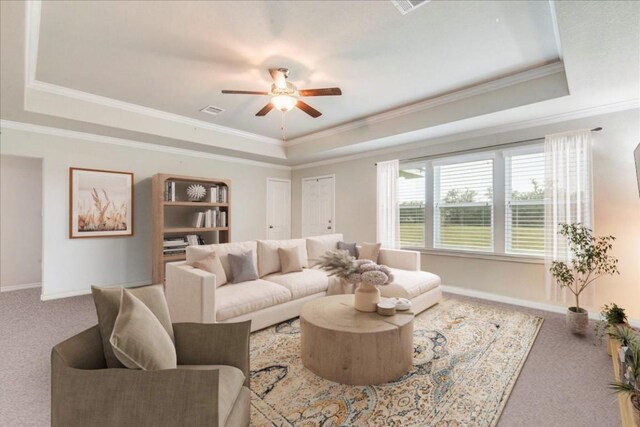 2525 Fm 32, San Marcos, TX 78666 - living room featuring a tray ceiling, carpet flooring, a ceiling fan, baseboards, and crown molding