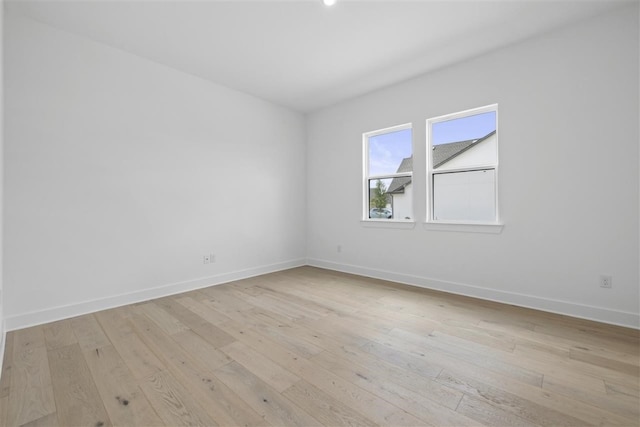 empty room with light wood-type flooring