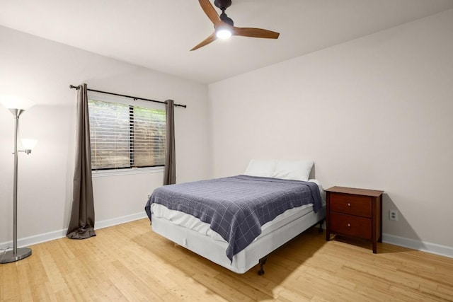 bedroom featuring ceiling fan and light wood-type flooring