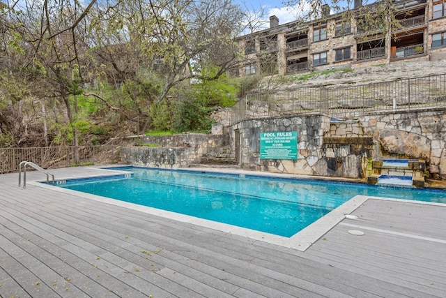 view of pool with a deck